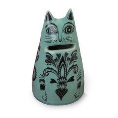 Lush Designs cat-shaped ceramic money bank with coin slot for mouth.  Turquoise with black printed pattern.