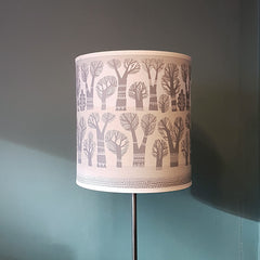 Lush Designs lampshade with pattern of winter trees in grey