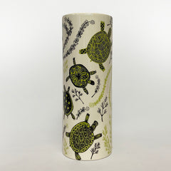 Tall vase with green and black turtle print