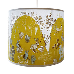 Lush Designs lamshade printed with countryside scene with rabbits in brilliant yellowy green
