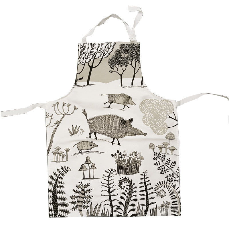 Wild Boar Apron Lush Designs Wild Boar print apron in white with beige and black print of wild boar, piglets and mushrooms