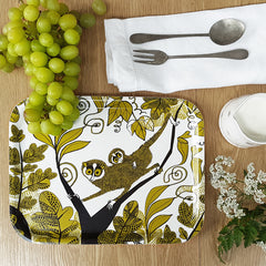 Lush designs loris-print tray in a lifestyle setting with green grapes, flowers and cutlery