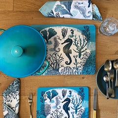Lush Designs seahorse mats with matching napkins and casserole dish