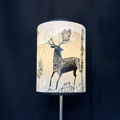Lampshade with deer design on a dark background