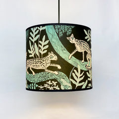 Lampshade in dark green with ocelot print and foliage in turquoise