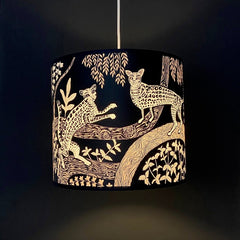Lampshade in black with ocelot print and foliage in pale pink