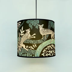 Lampshade in dark green with ocelot print and foliage in turquoise