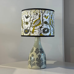 printed ceramic lamp base with bird print lamp shade
