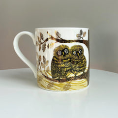 Dear baby owls on a bone china mug with gold lustre details