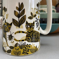close-up of cat print jug in yellow and black