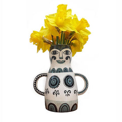 Lush Designs lady-shaped vase with daffodils