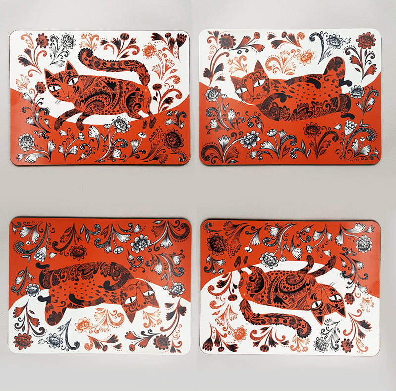 Set of 4 mats with playful tabby kitten print in orange and black