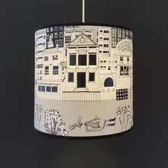 Lush Designs townscape lampshade with grey river with dead body in it