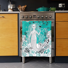 Mermaid tea towel hanging on the cooker