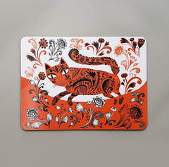 Table mat with orange black and white print of kitten walking