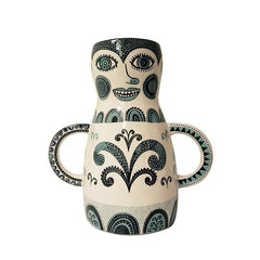 Lush Designs vase that is shaped like a funny-faced lady with handles that look like arms