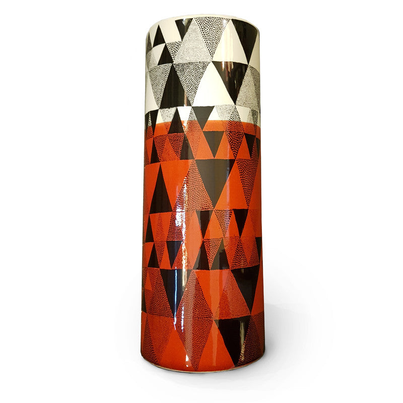 Geometric design of triangles printed vase in orange, black and white