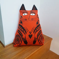 Lush Designs cat-shaped cushion in orange and black