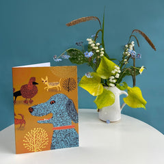 Dog print birthday card with posy of flowers in a jug