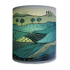 Lush designs Small lampshade with a print of a landscape of rolling hills in beautiful greens