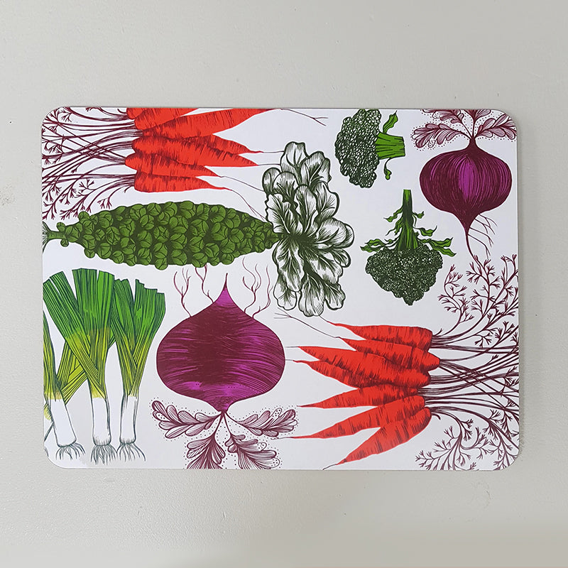 Lush Designs table mat printed with images of carrots, brocolli, beetroot, leeks and brussels sprouts